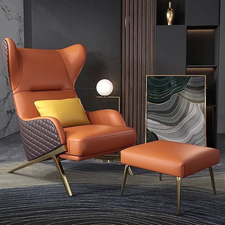 Cognac leather wingback chair with ottoman and gold legs