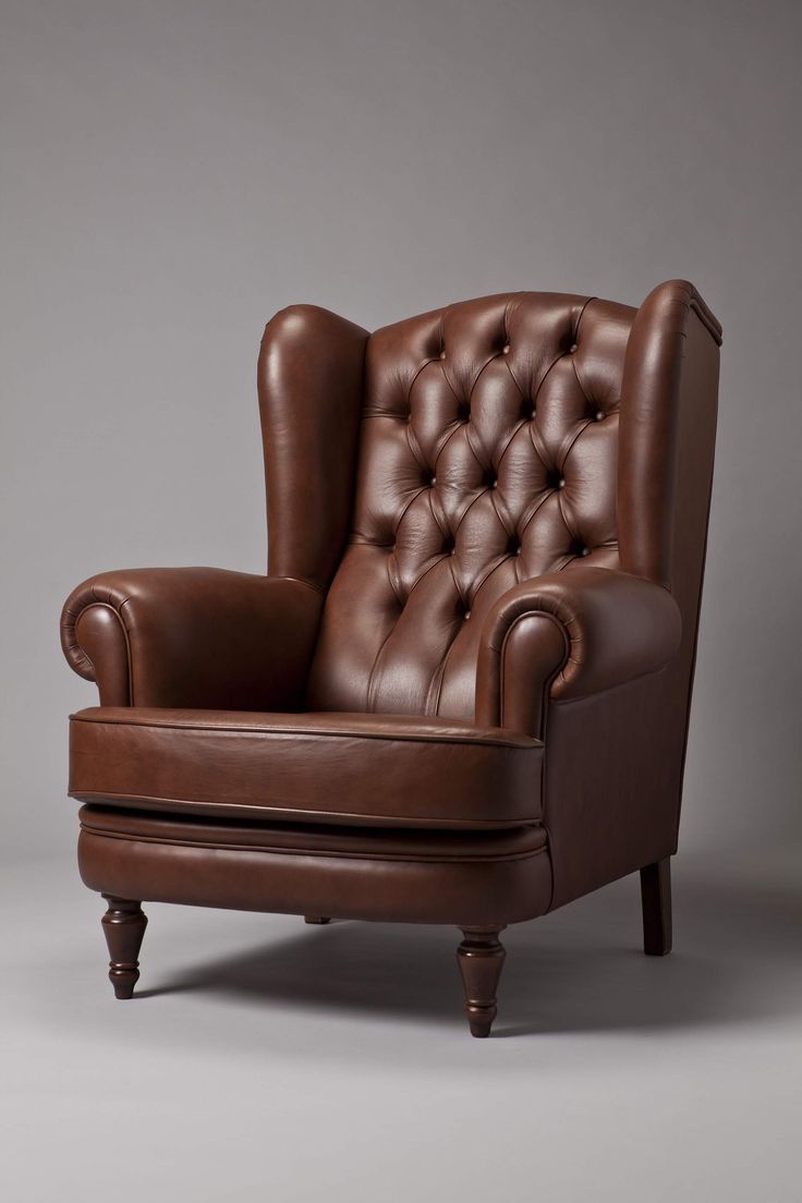 Espresso brown leather tufted wingback chair