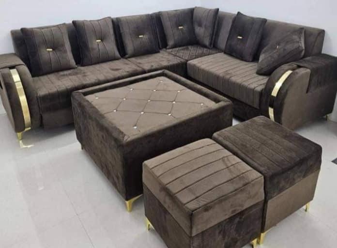 Deep teal velvet corner sofa with gold trim
