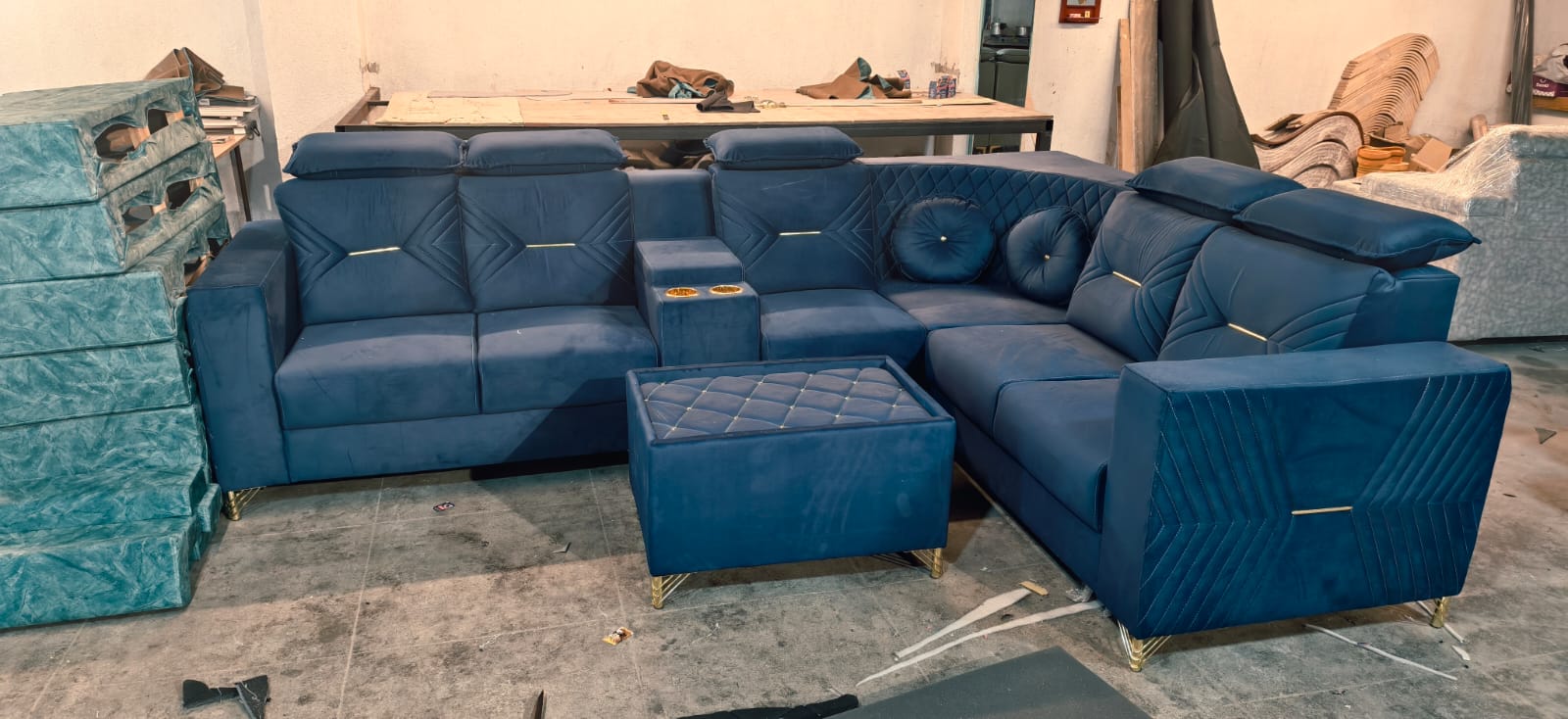 Navy blue quilted corner sofa set with gold legs