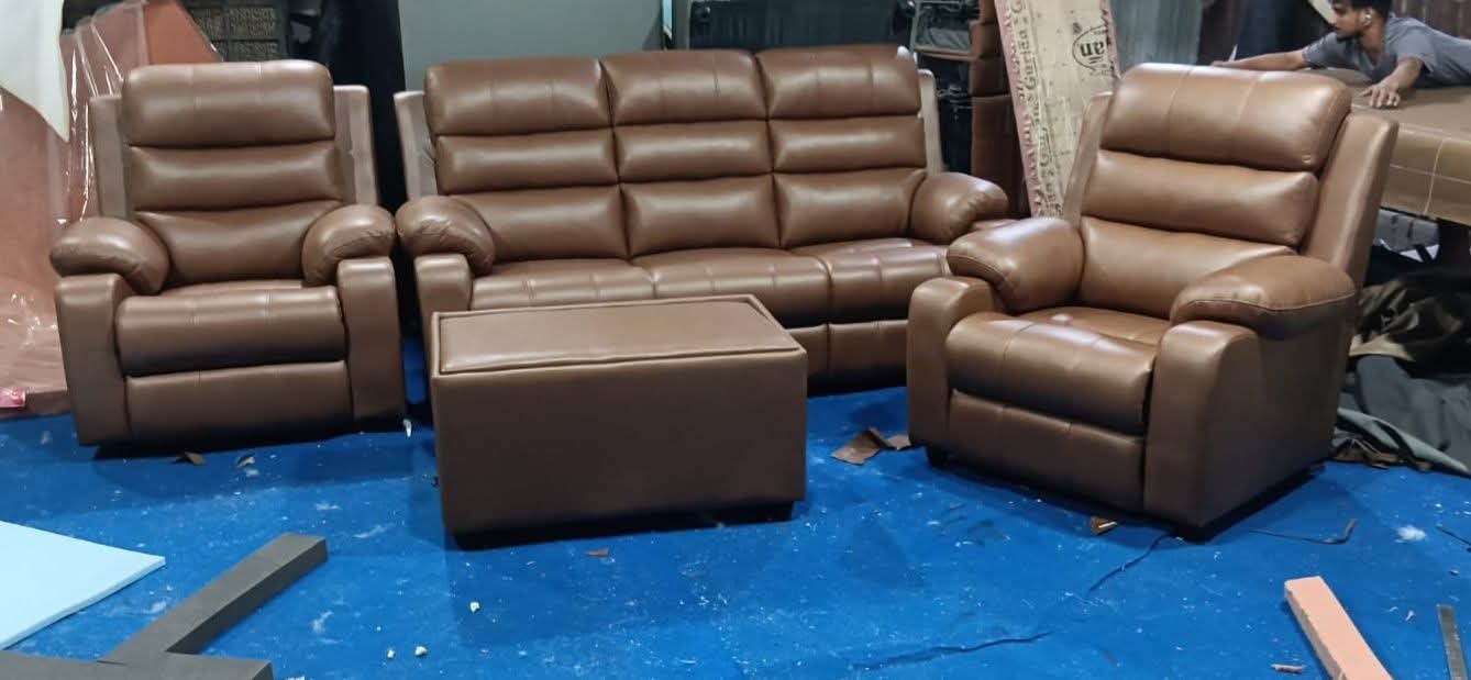 Cognac brown leather three-piece reclining sofa set