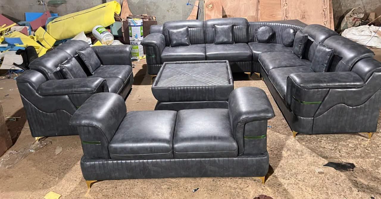 Grey leather U-shaped sofa set with ottomans