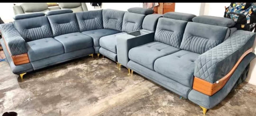Slate blue velvet corner sofa set with wood trim and gold legs